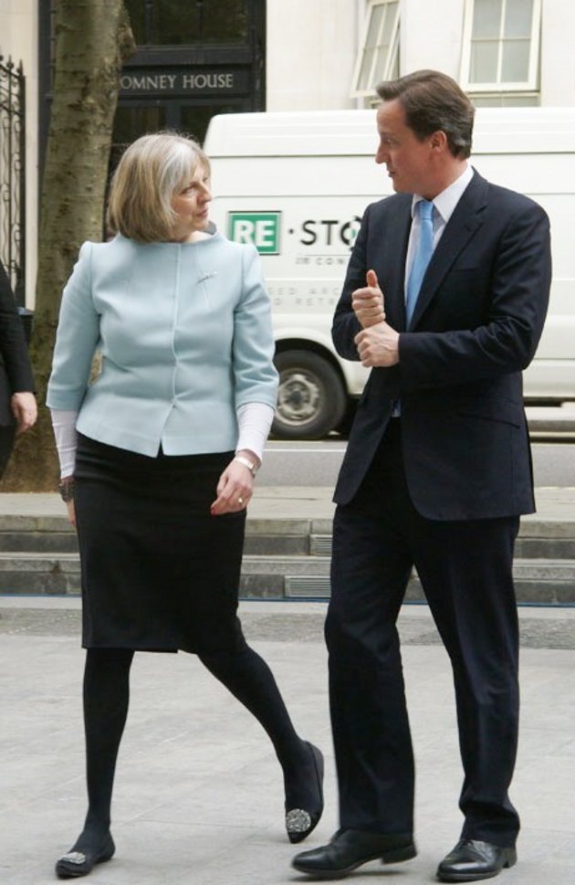1Prime Minister David Cameron is met by Theresa May on his first visit to the Home Office in May 010; @ ukhomeoffice / Wikimedia Commons CC BY .0